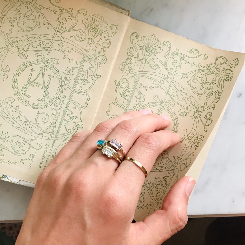 Three gold stacking rings